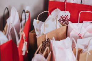 Gift bags with holiday print paper