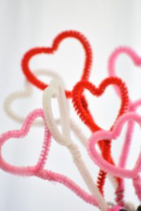 red, pink, and white valentine's day hearts made of pipe cleaners