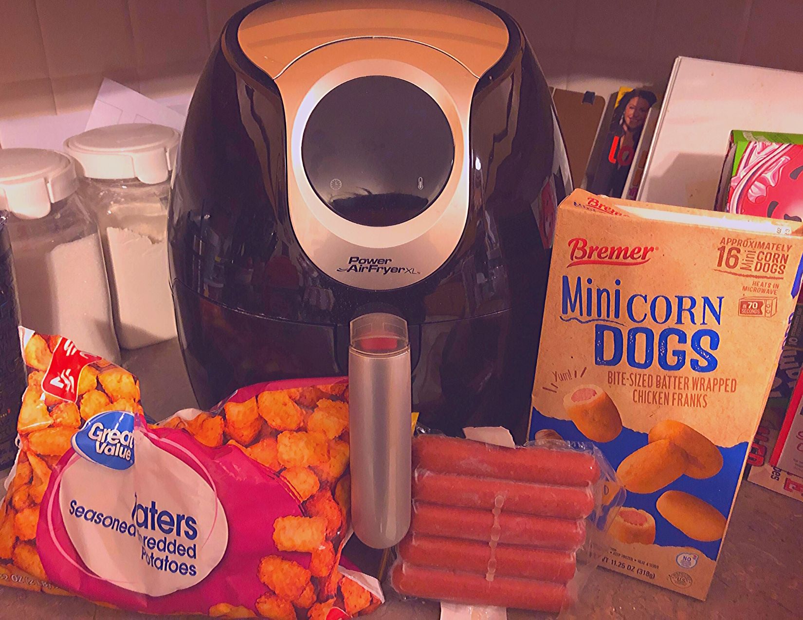 air fryer next to corn dogs and frozen tater tots