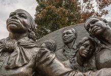 12 Books to Help Our Children Learn About Black History Month A statue depicting famous African Americans in honor of Black History Month