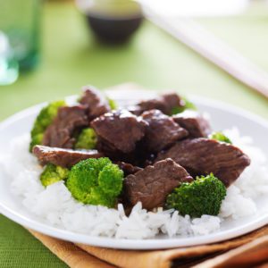 stir fried beef and broccoli over rice