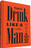 An orange book with the title, Drink Like a Man, an essential cocktail guide for Father's Day