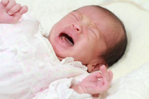 a girl baby crying