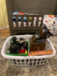 a laundry basket full of toys to move in and out of the house easily when showing your house when moving