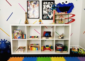 a playroom toy shelf with toys easily displayed, per the Montessori method
