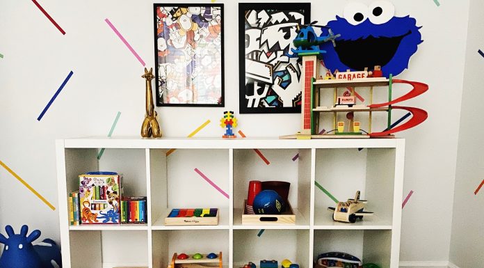 a playroom toy shelf with toys easily displayed, per the Montessori method