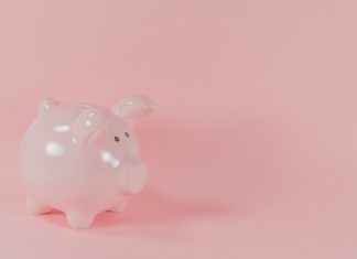 a pink piggy bank symbolizing financial independence