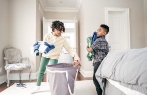 letting kids help as they put laundry from the basket away
