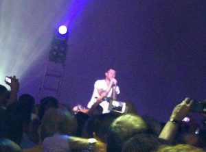 Adam Levine singing at a private concert