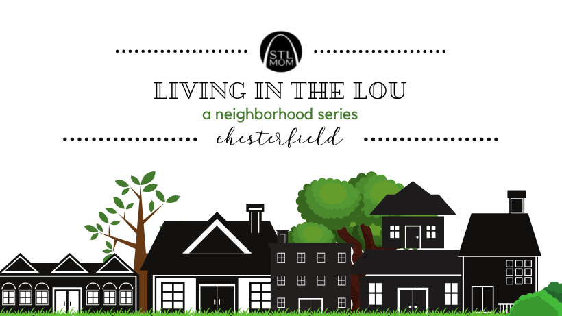 a neighborhood sketched with black and white homes, with green trees behind them with a banner across the top saying, “Living in the Lou: Chesterfield”