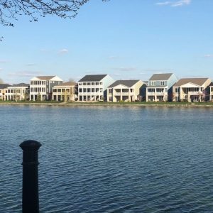 a row of homes along a lake in Newtown, St. Charles