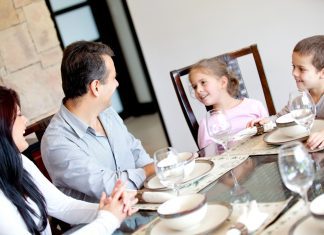 a family talking around the dinner table, using the time for connection