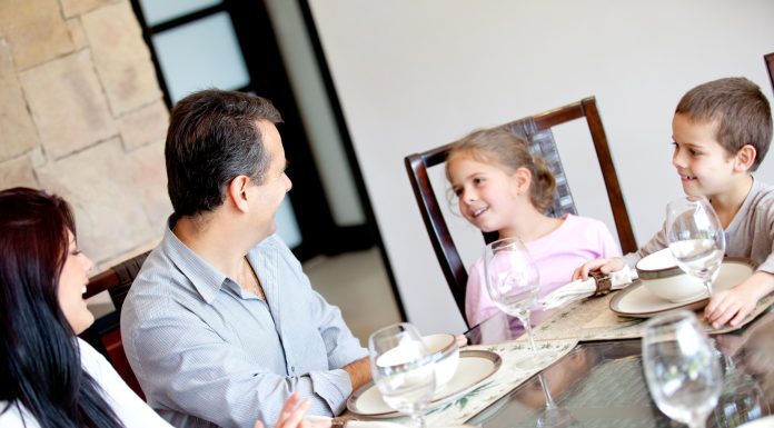 a family talking around the dinner table, using the time for connection