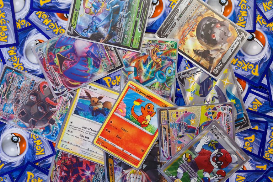 a messy pile of Pokemon cards