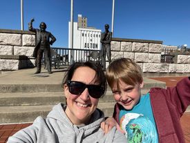 A mom and her toddler son in front of the Lincoln / Douglas debate memorial in Alton, IL