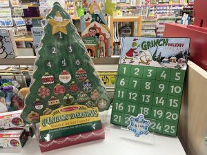 a Countdown to Christmas calendar and a Grinch holiday countdown at a toy store