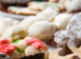 a close-up of a plate of holiday cookies at a holiday cookie exchanges