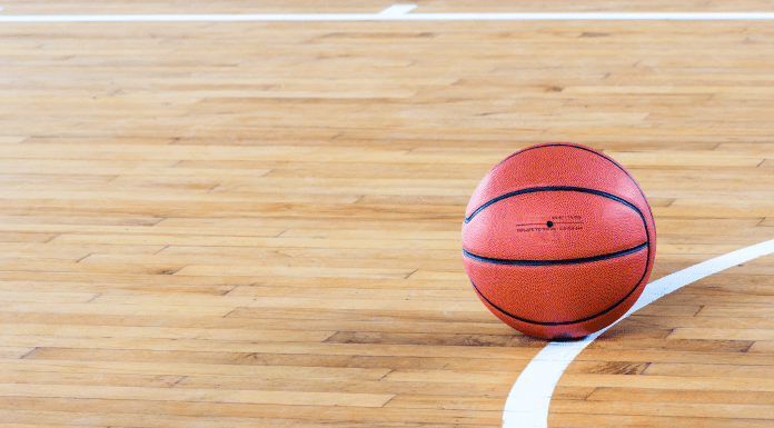 a basketball on the floor of a court