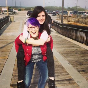 a mom carries her adult daughter on piggy back to make her daughter's day