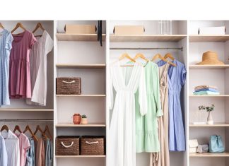 an organized walk in closet full of in style clothing