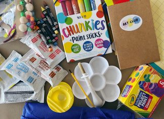 a variety of art supplies spread out on a table
