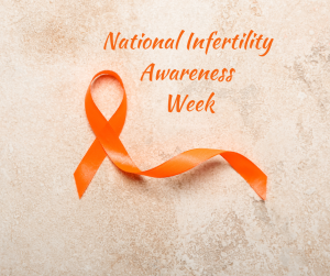 an orange ribbon on a marbled background with the words, "National Infertility Awareness Week"