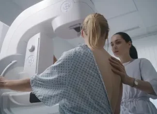 a woman getting a mammogram