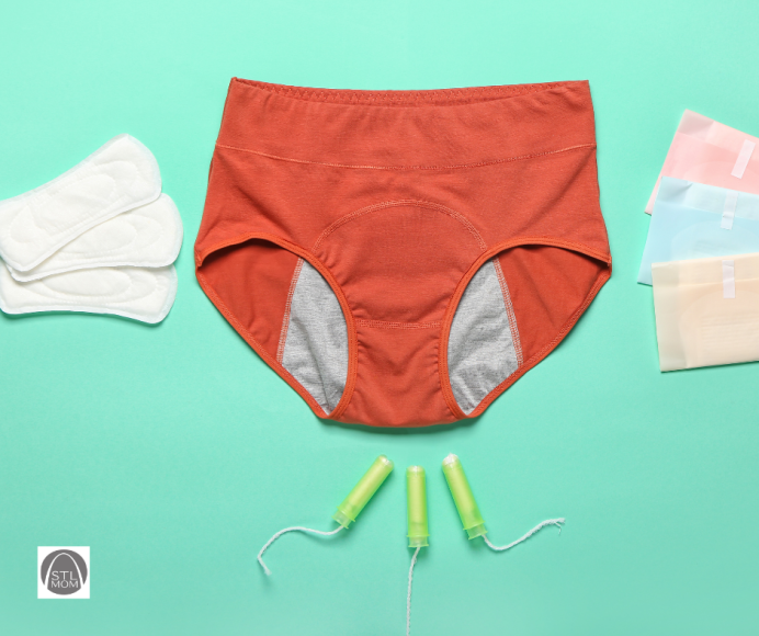 a pair of period underwear on a sea green background with tampons and pads next to it