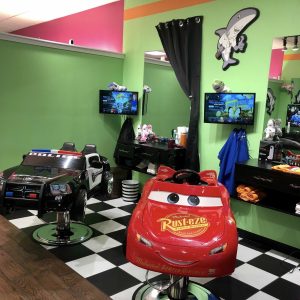 kid-friendly hair salon with a Cars themed seat for haircuts