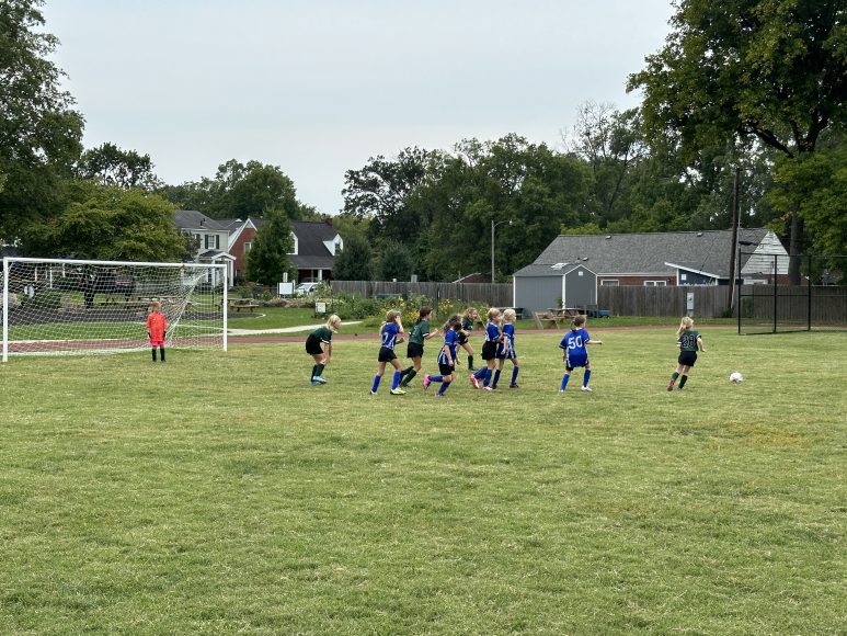 kids playing CYC sports on a soccer field