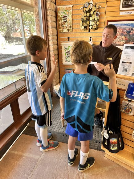 two boys getting Junior Ranger badges at Smoky Mountains National Parks