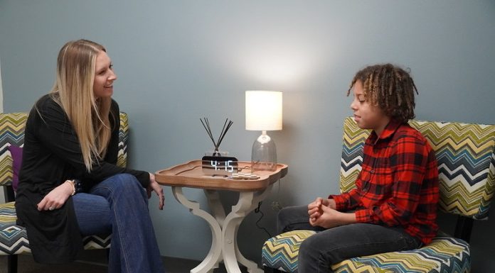 a young teen meeting with a PreventEd counselor to address substance use