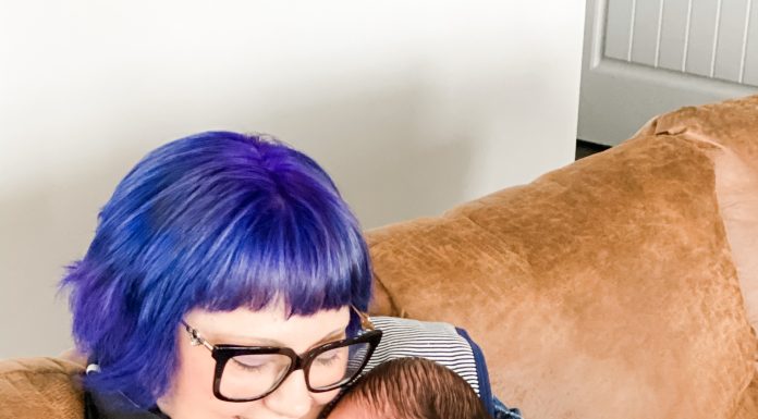 Radical Self-Love for Moms in Every Season Grandma holding first grandchild