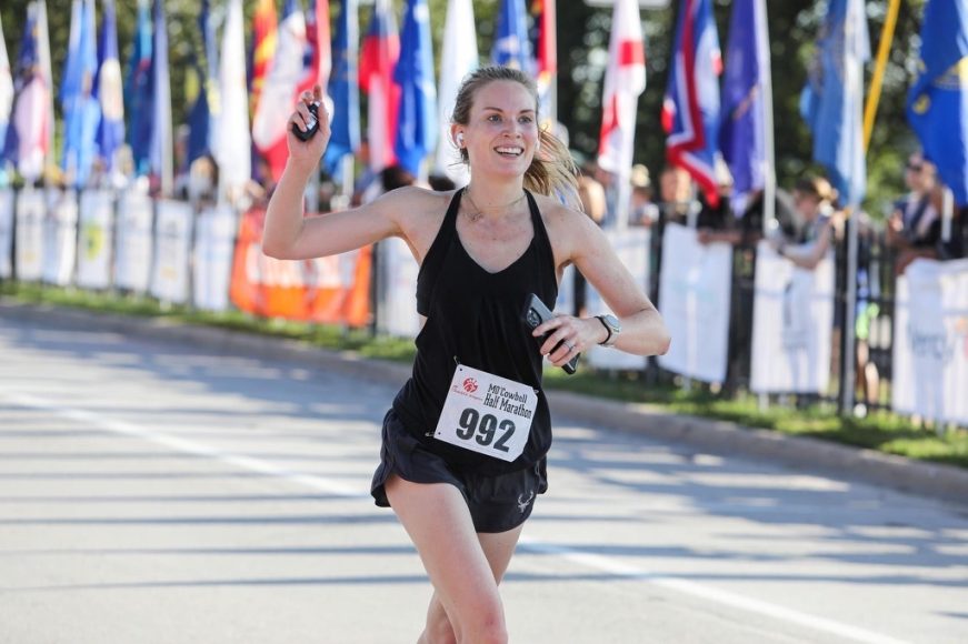 a woman running in a race
