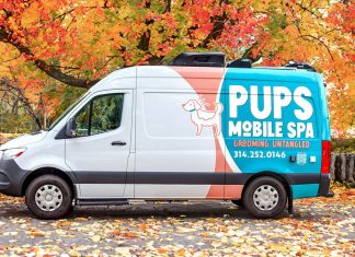 Grooming, Untangled: A Stress-Free Way to Care for Your Pup Right at Home a Pups Mobile Spa van on a driveway covered in leaves that have fallen