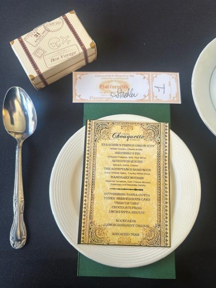 a menu sitting atop a place setting from La Patisserie Chouquette, one of the STL Top 100 restaurants