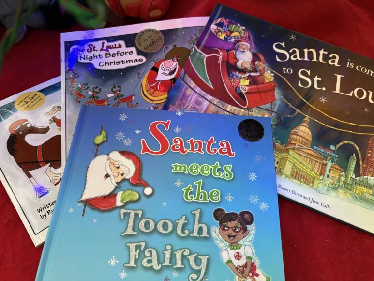 Image of St. Louis themed books under the tree.