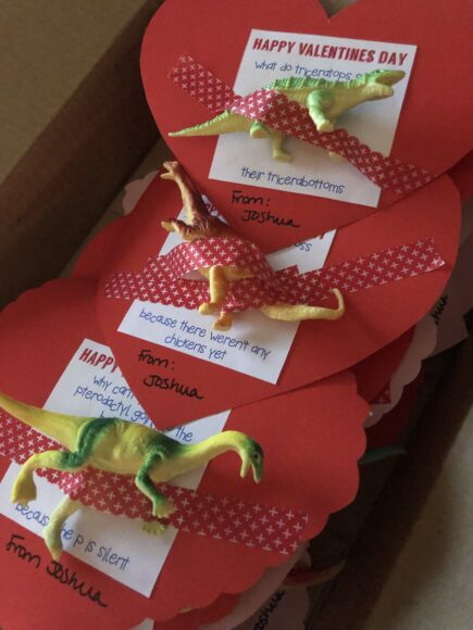 Classroom Valentine's with mini dinosaurs.